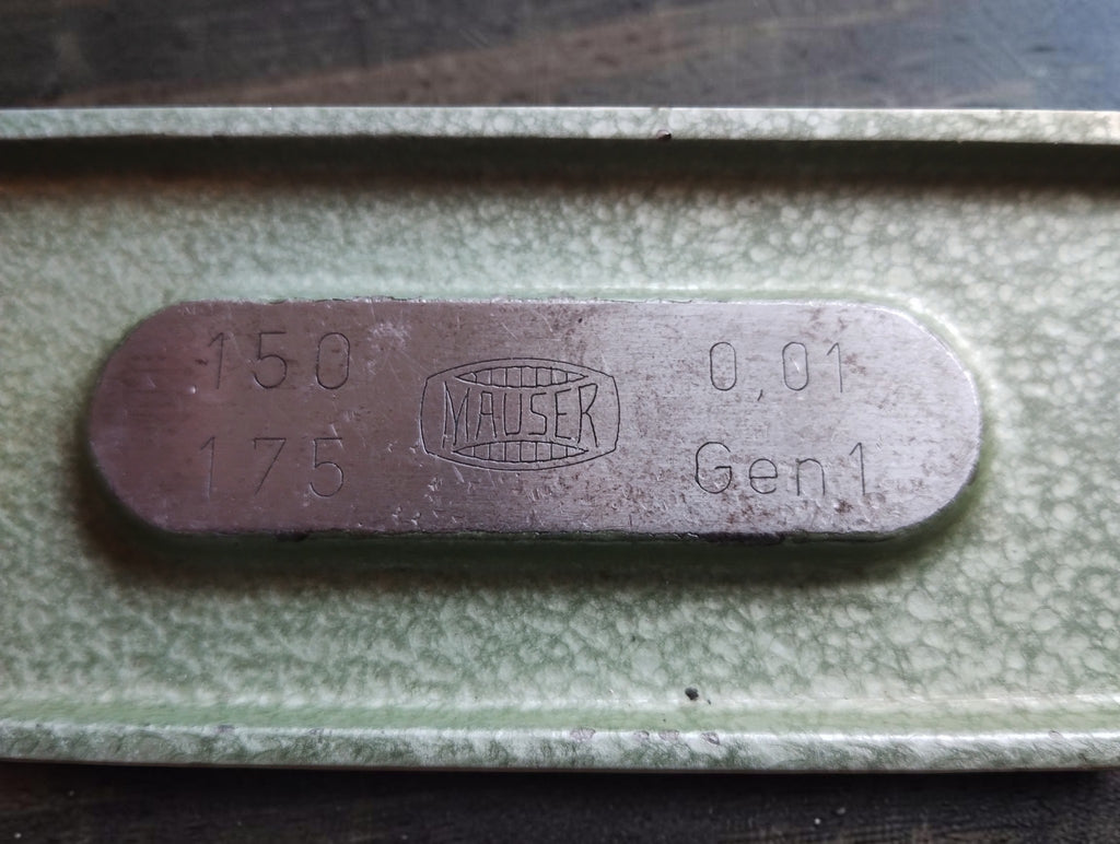 Mauser micrometer identification plate marked 150–175 and 0.01.
