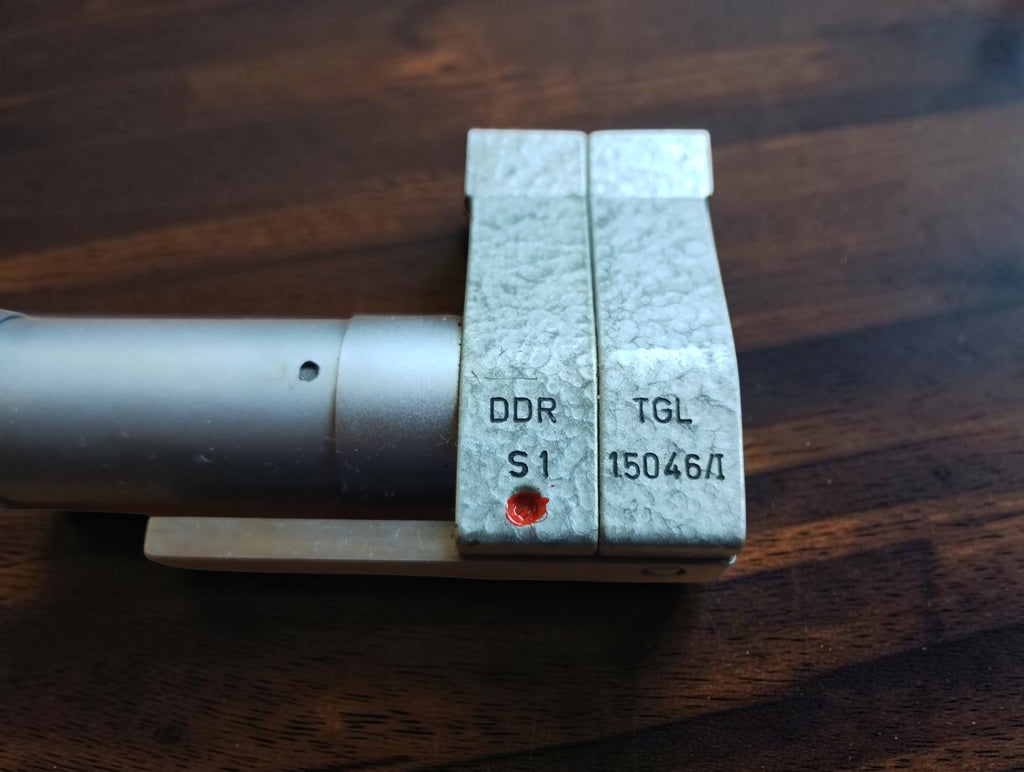Close-up of DDR, S1, and TGL markings on the inside micrometer
