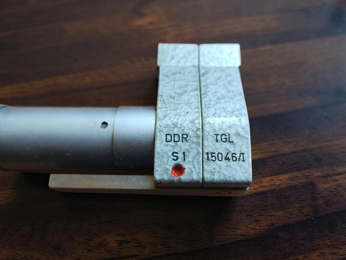 Close-up of DDR, S1, and TGL markings on the inside micrometer
