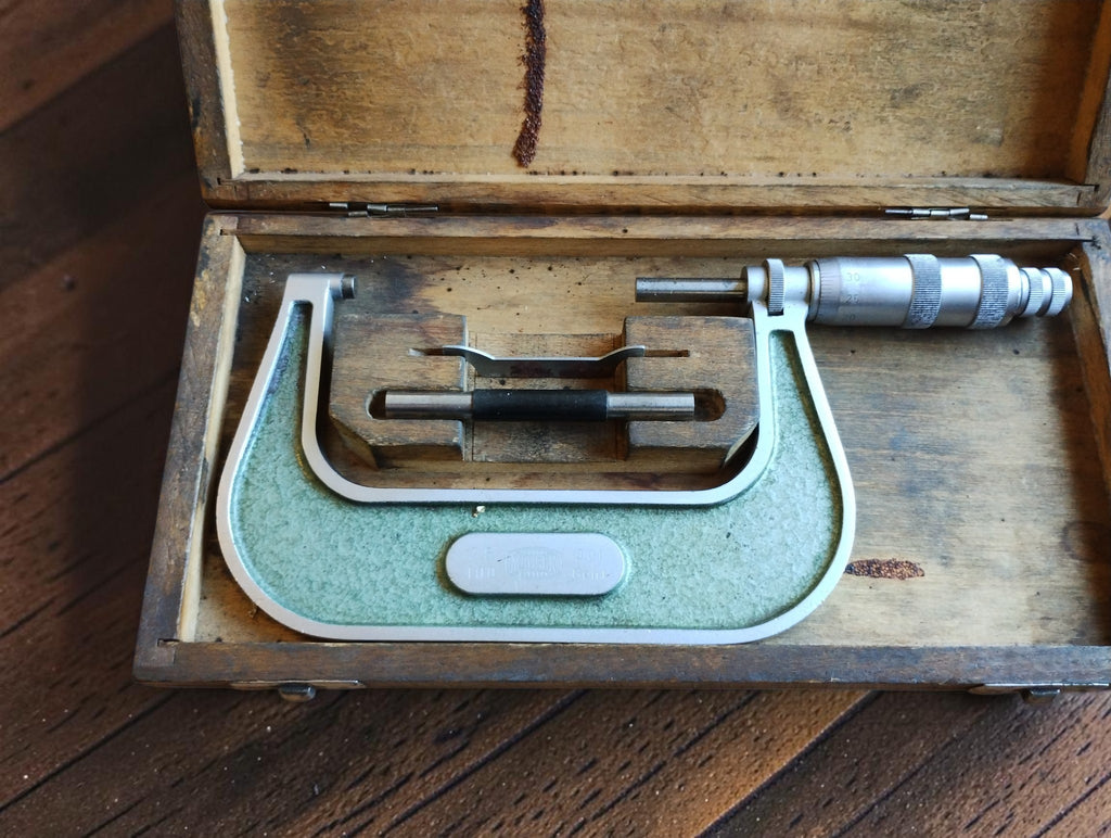 Vintage MAUSER 75–100 mm outside micrometer in an open wooden case with reference rod and adjustment wrench
