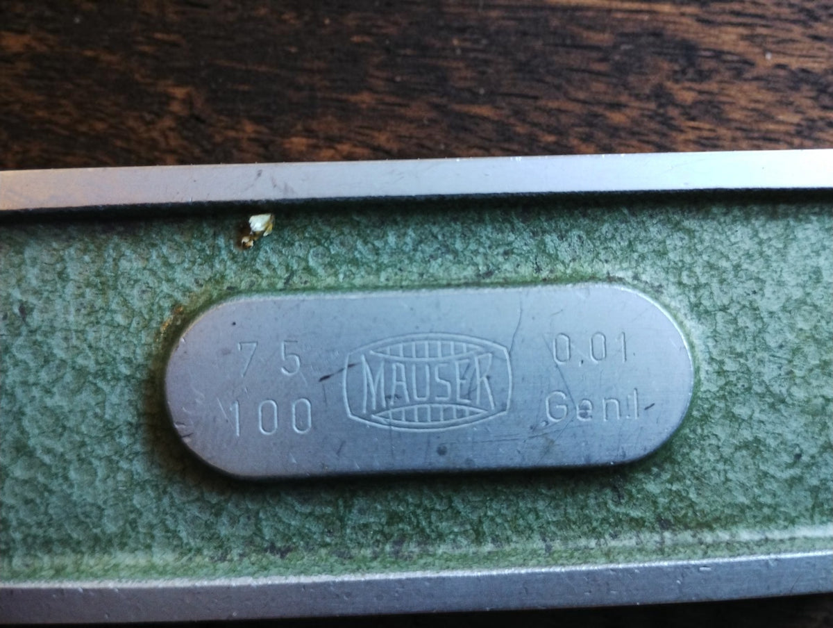 MAUSER maker’s plate showing the 75–100 mm measuring range and 0.01 mm graduation
