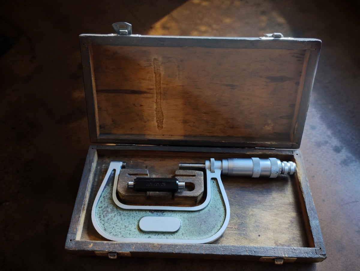 MAUSER 50–75 mm outside micrometer with setting standard in an open wooden case
