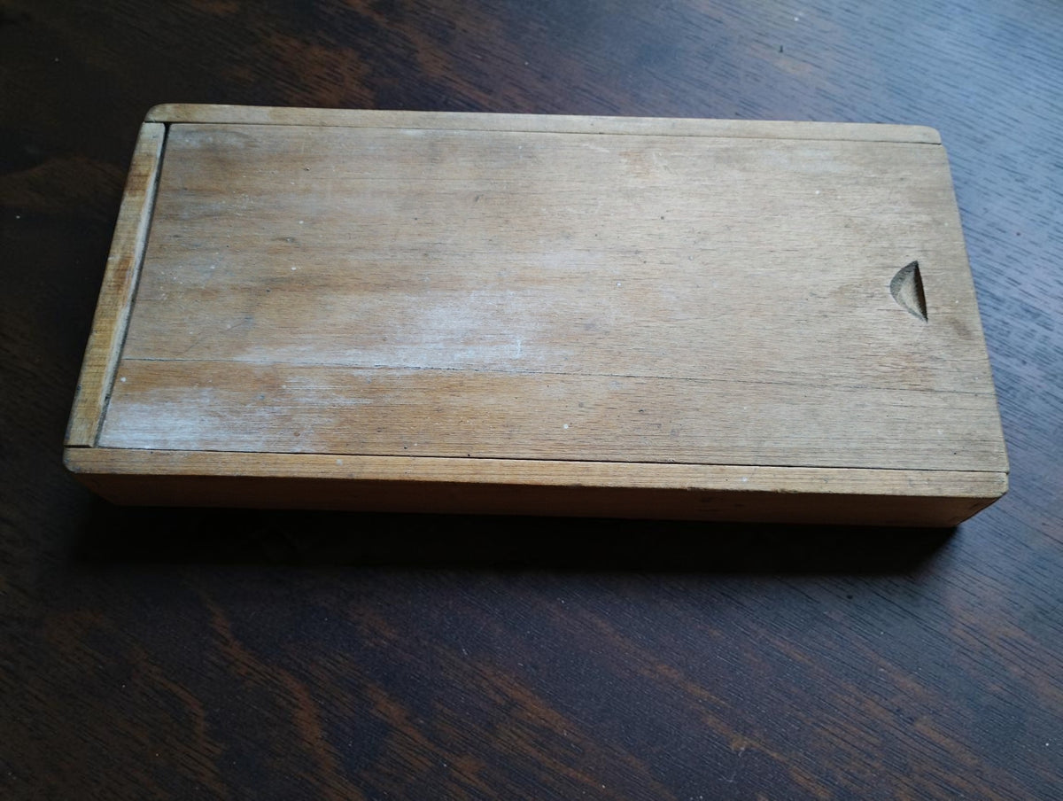 Closed wooden sliding-lid storage case for the vintage TESA 75–100 mm outside micrometer.
