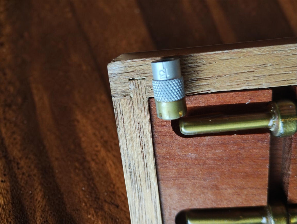 Small component and extension rod in the wooden case of the Somet inside micrometer set, NOS, still in protective grease.
