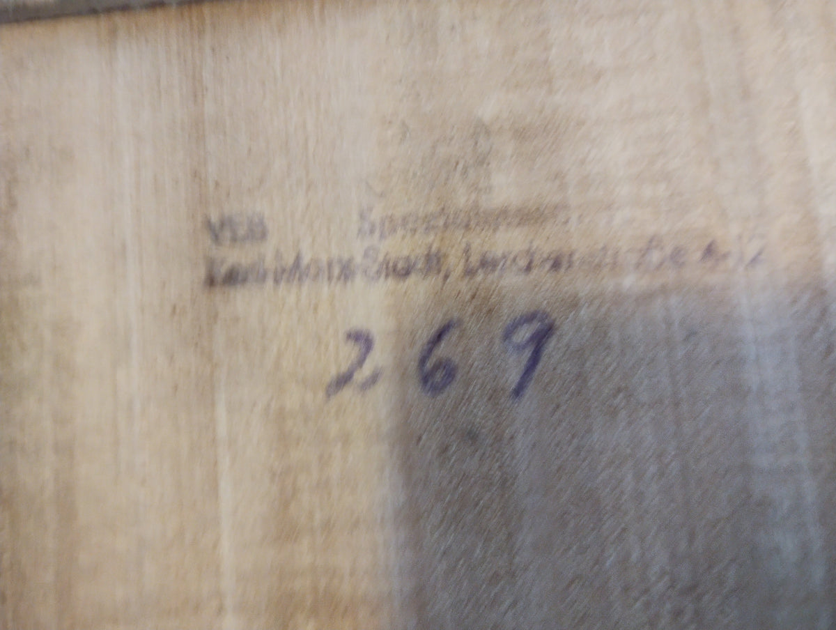 Faded stamp and handwritten number 269 on the wooden underside of the vintage apothecary set.
