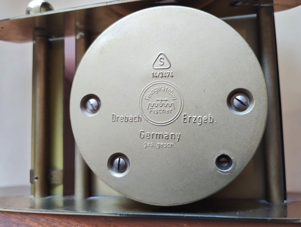 Rear maker's marks on the Fischer barometer, showing Feingerätebau Fischer, Drebach Erzgeb., Germany, the S symbol and code 14/3474.
