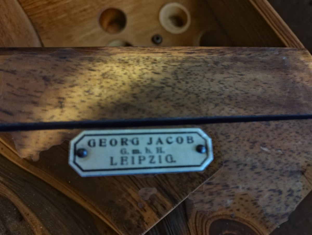 Georg Jacob G.m.b.H. Leipzig maker's plate attached to the wooden tool case
