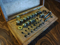 Georg Jacob Leipzig Jacot pivot-burnishing tool set in an open wooden case with numbered compartments
