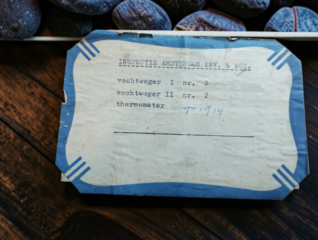 Amsterdam import duties and excise inspection label listing two hydrometers and a thermometer.
