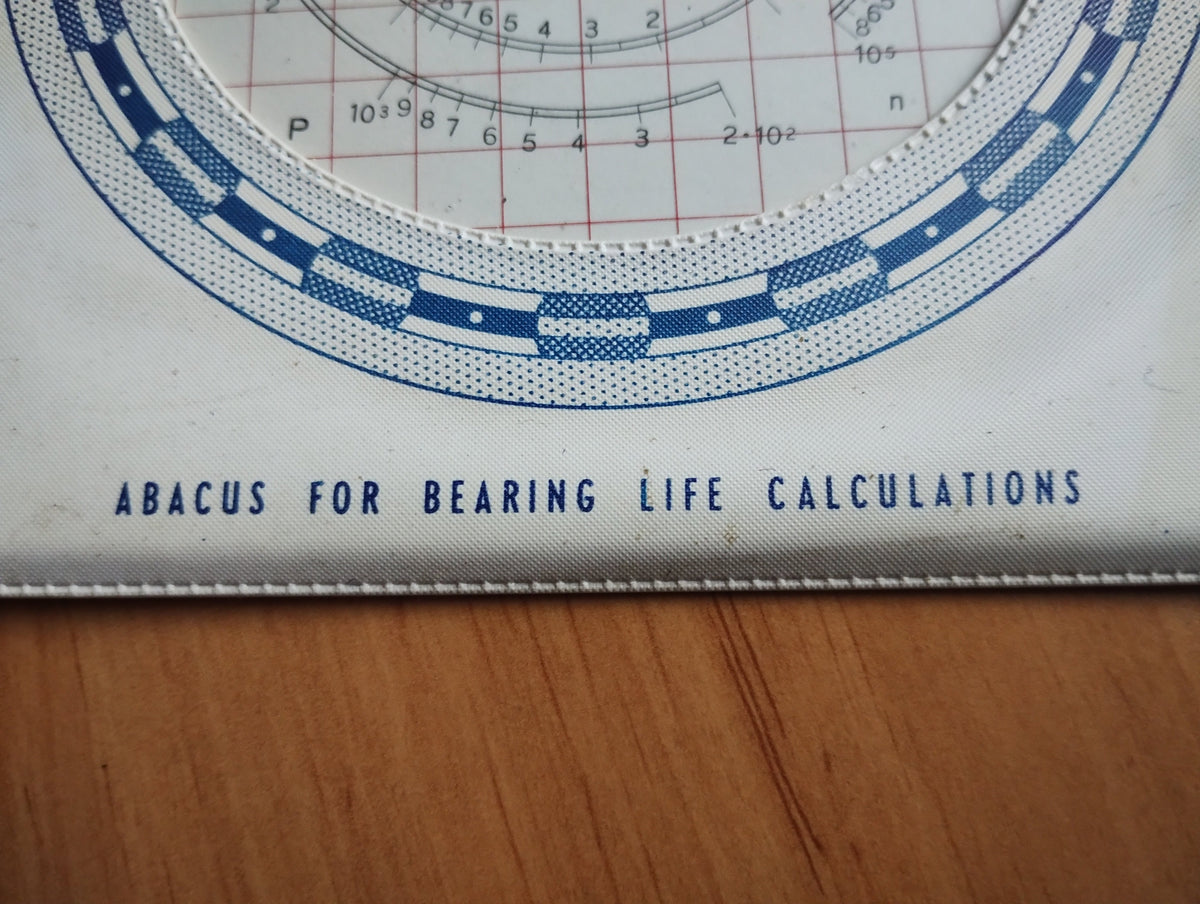 Detail of the RIV calculator showing the “Abacus for Bearing Life Calculations” inscription and blue-and-white border.
