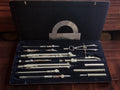 Precision drafting set attributed to Gebrüder Haff Pfronten, with compasses, drawing pens and a metal protractor in an open fitted case.
