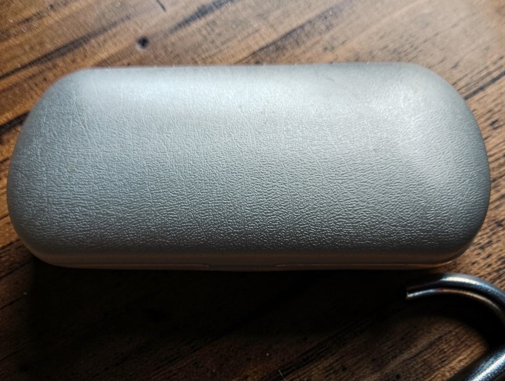 Closed light gray textured storage case for the Carl Zeiss Jena micrometer.
