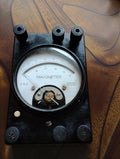 Gossen Mavometer analog multimeter with black housing, glass dial window and six knurled terminals.
