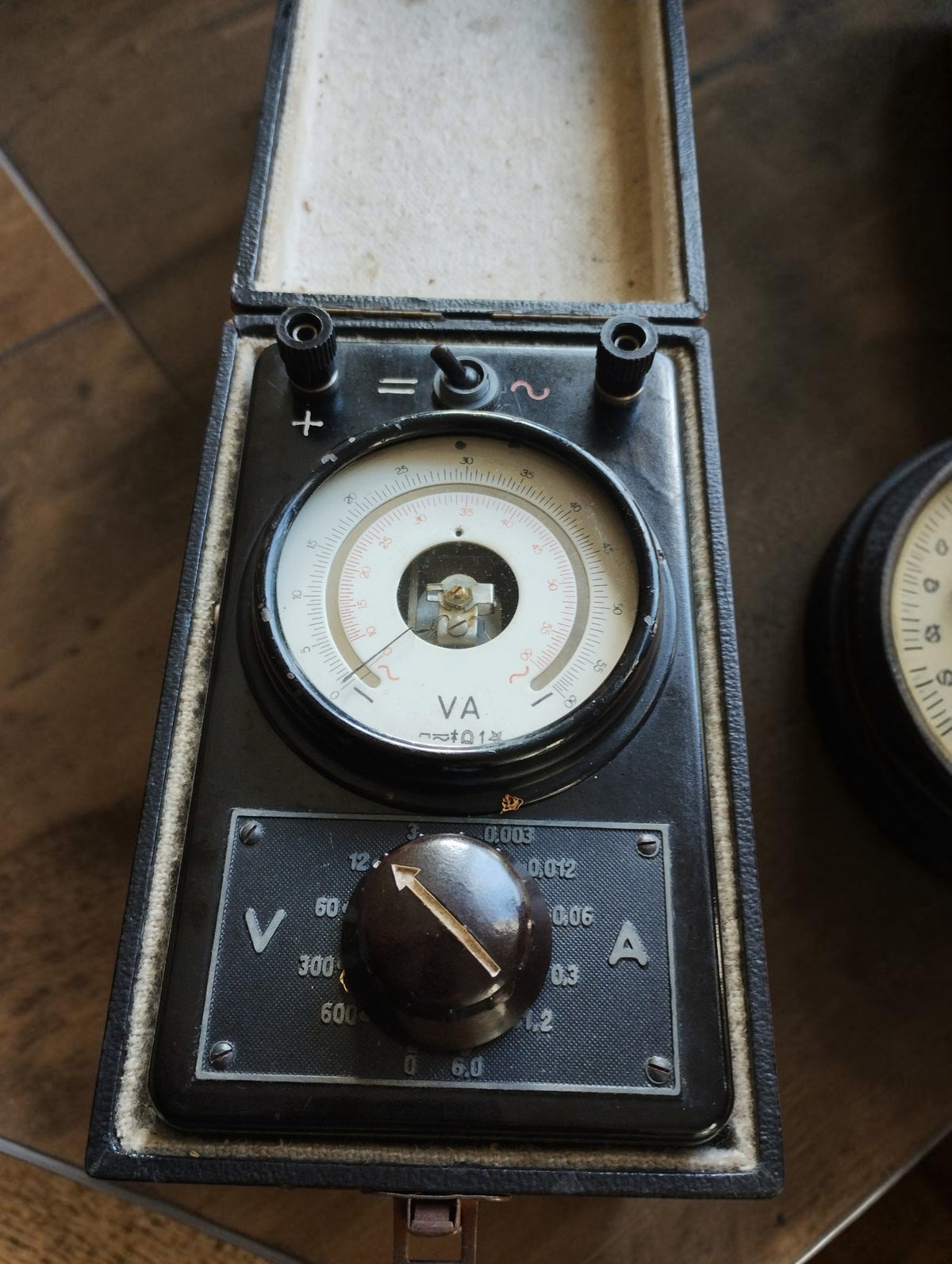 Metrawatt MHU 15 VA analog volt and amp meter in its open carrying case
