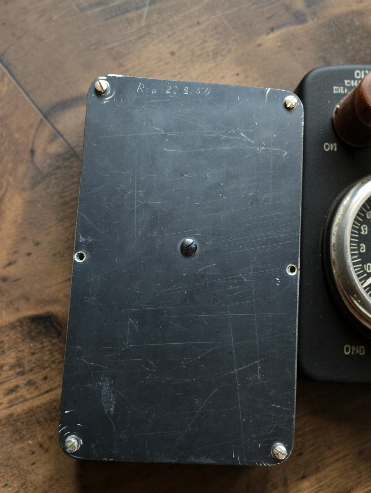 Rear panel of the Metrawatt MHU 15 VA meter with scratches and an engraved inscription
