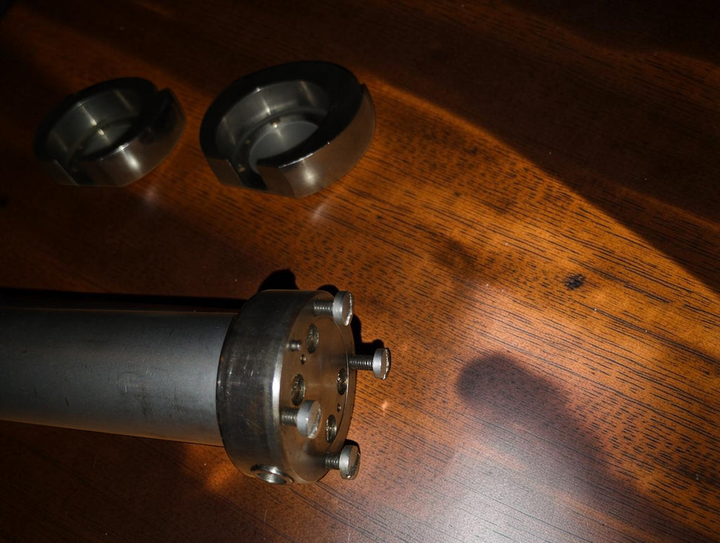 Detail of the Carl Zeiss Jena Passimeter mounting end with adjustment screws and two detached measuring heads

