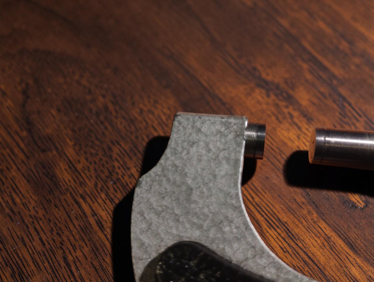 Close-up of the anvil and spindle measuring faces on the Suhl DDR outside micrometer
