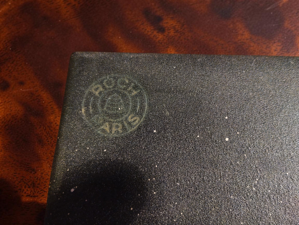 Embossed round ROCKT Paris logo on the lid of the original presentation case
