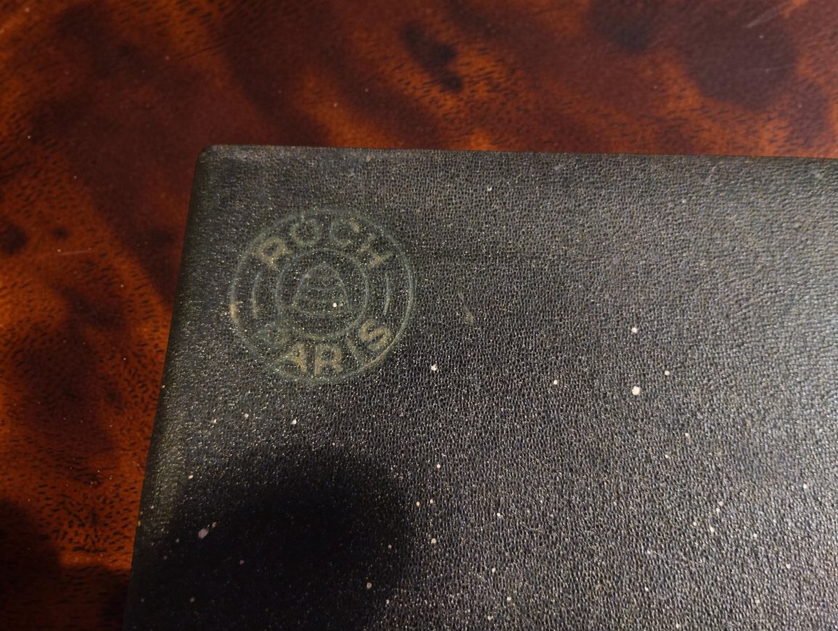 Embossed round ROCKT Paris logo on the lid of the original presentation case
