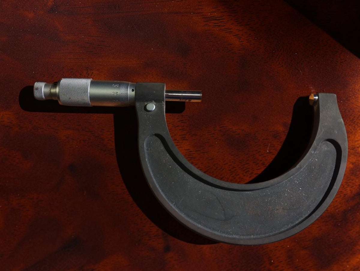 Back view of the ROCKT Paris 75-100 mm micrometer showing the thimble graduations
