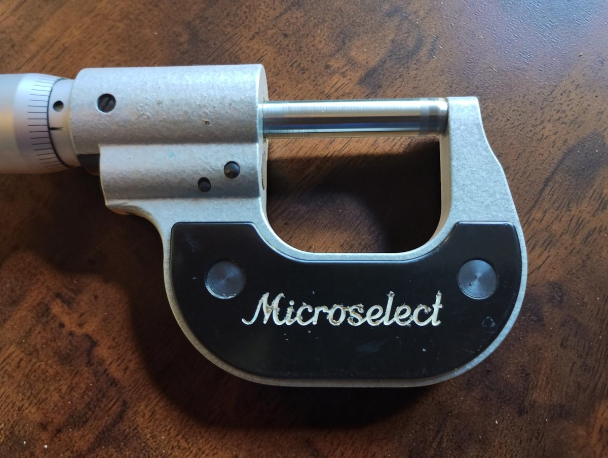 Rear view of the Etalon micrometer showing the Microselect marking and signs of use
