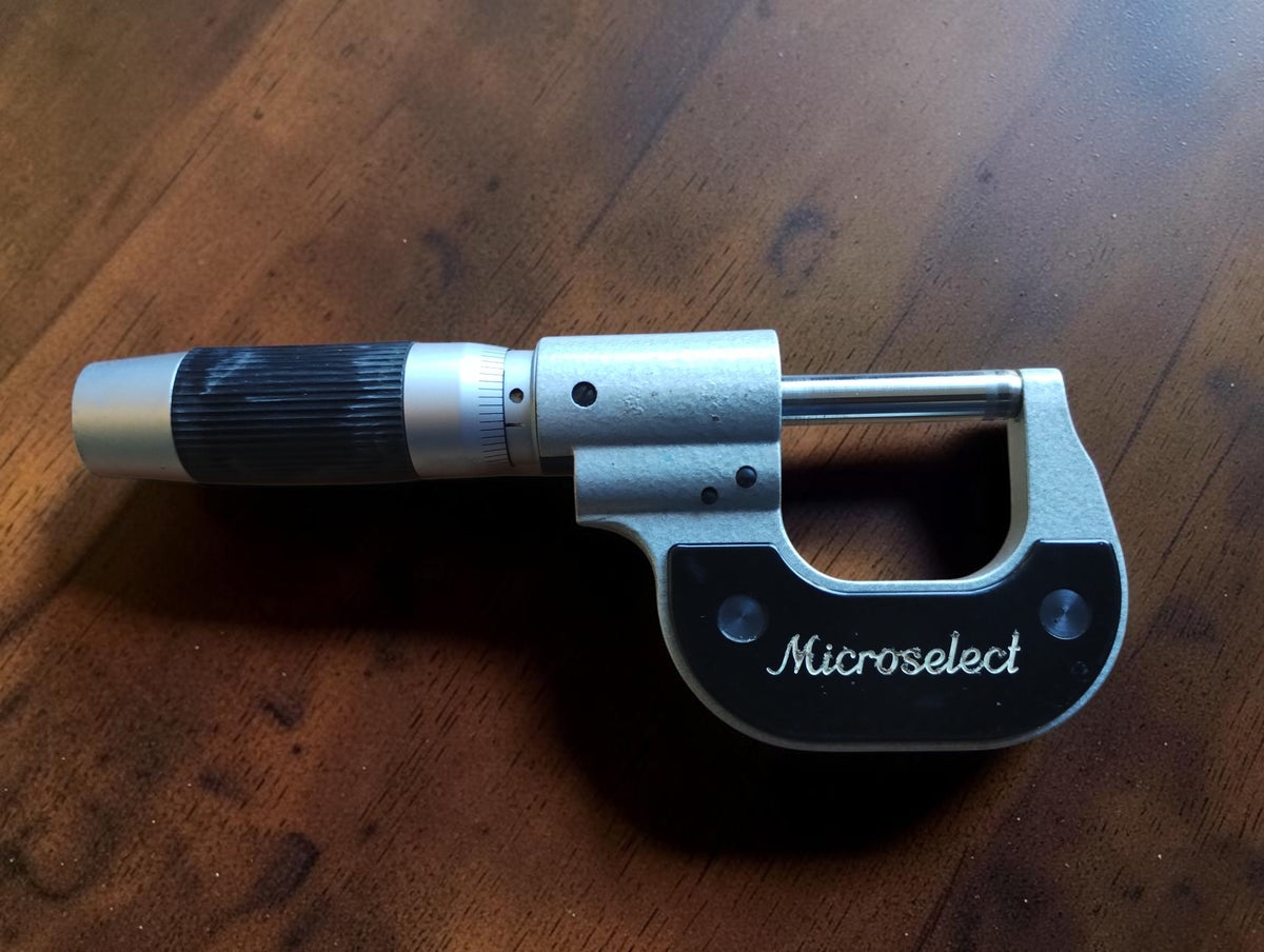Etalon Microselect outside micrometer viewed from the back, with black ribbed thimble grip
