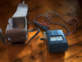 Vintage Gossen ISOGNOM 500 V insulation resistance tester with hand crank, brown leather carrying case and test leads.
