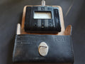 Vintage Gossen Post 60 V megohmmeter with open Hartmann & Mildner leather carrying case dated 1960.
