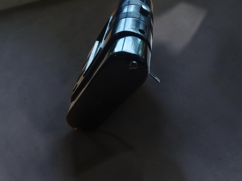Angled side view of the black Gossen Post megohmmeter in its leather carrying case.

