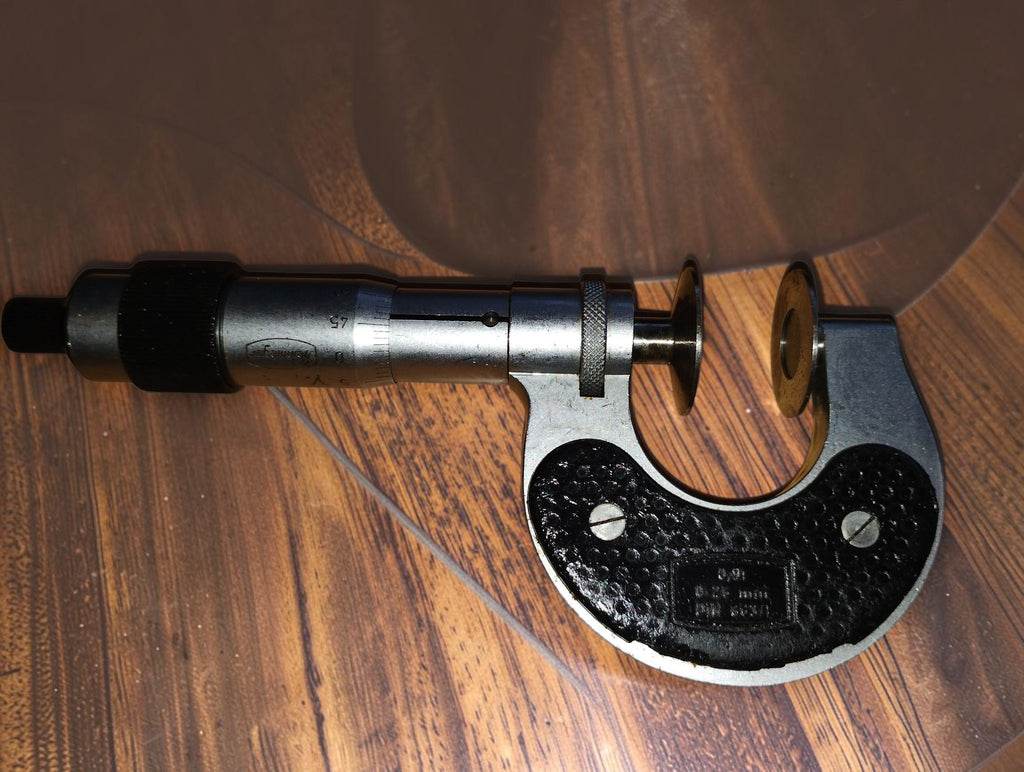 Reverse view of the Steinmeyer disc micrometer showing the measuring faces, spindle and black frame
