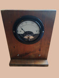 Hartmann & Braun 250 V analog voltmeter mounted on a wooden demonstration stand, front view
