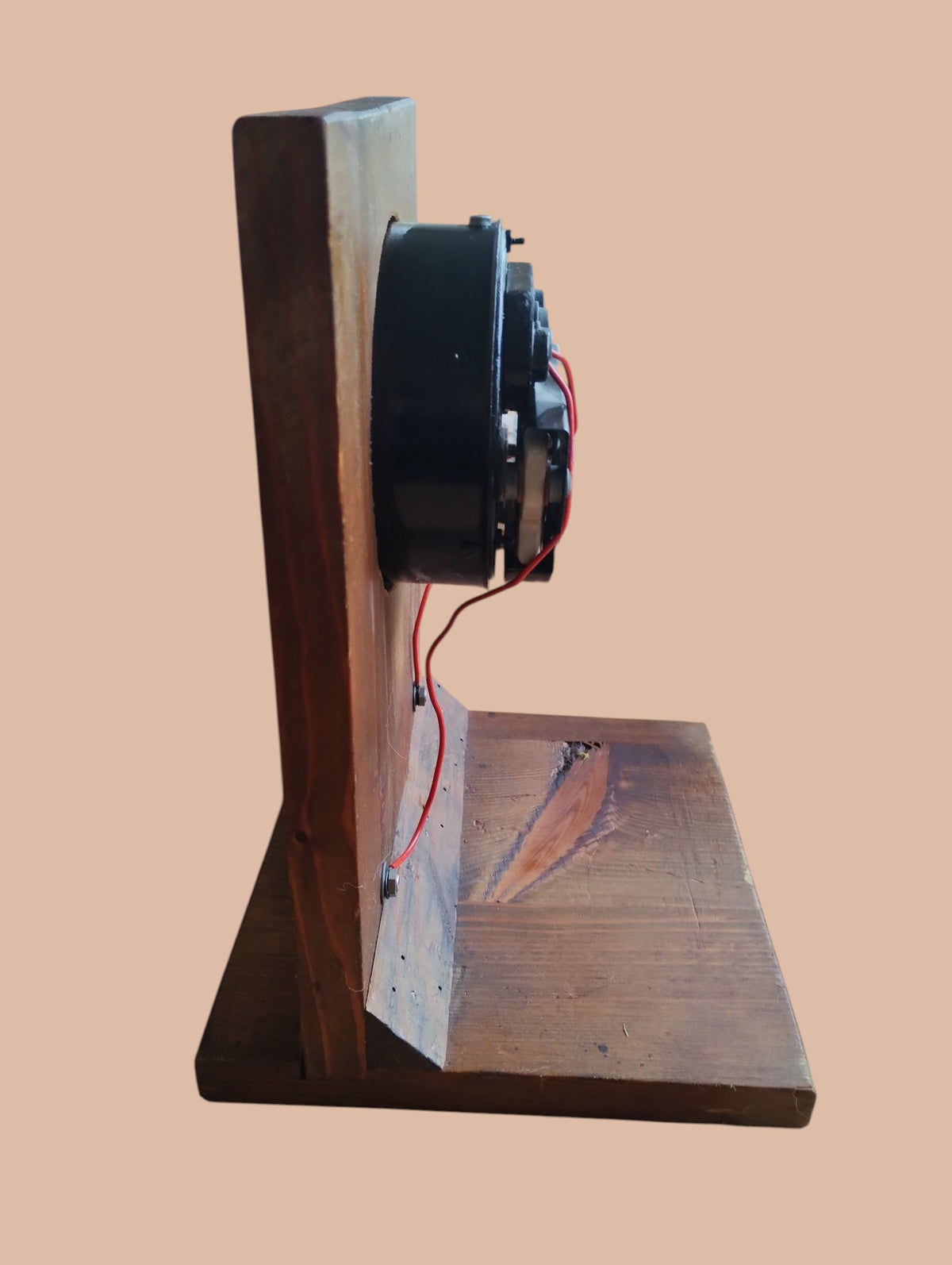 Side view of the Hartmann & Braun voltmeter showing the rear housing and wiring on the wooden stand

