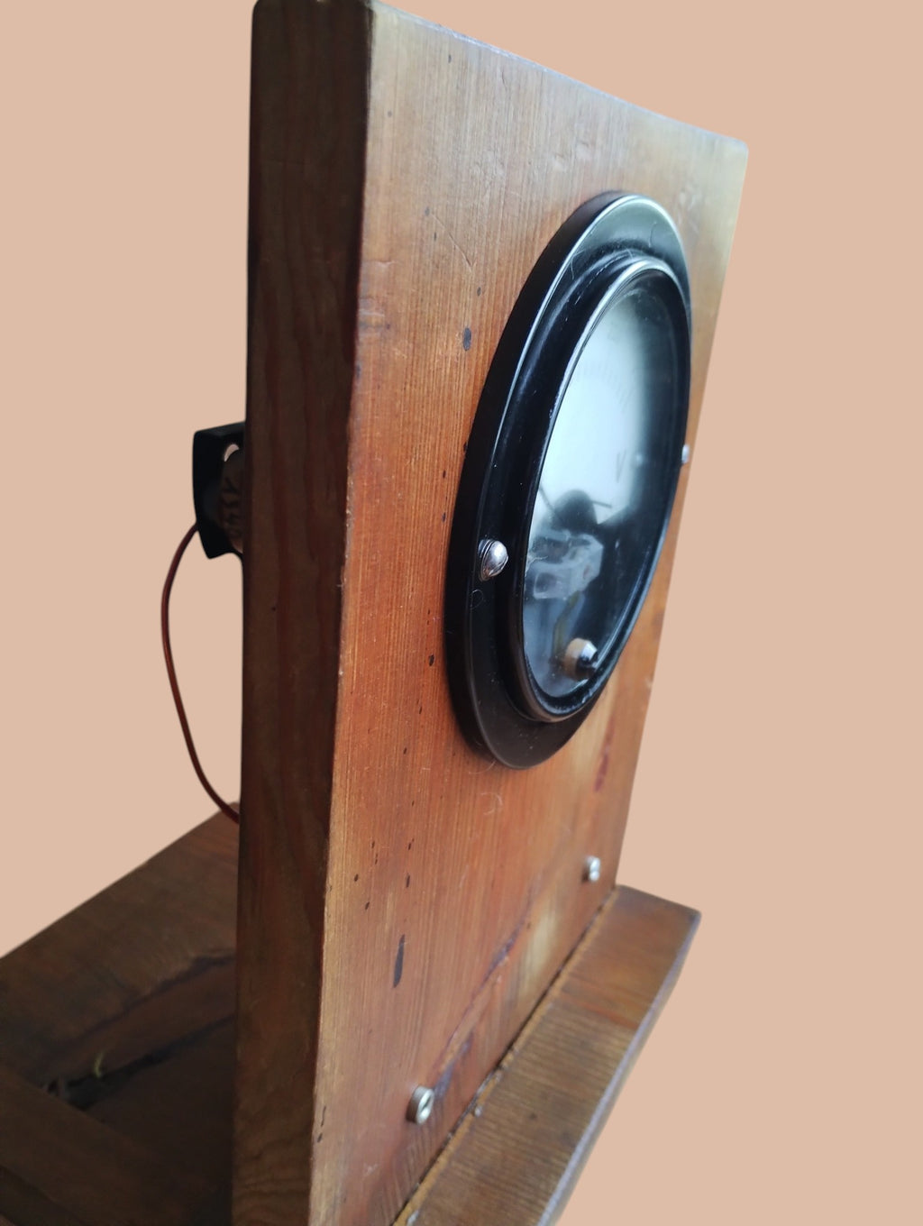 Side view of the Hartmann & Braun H&B ammeter showing the wooden panel and supporting base
