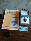 Goerz Electro Unigor 4p analog multimeter with German instruction manual and vintage NSF resistor color code slide
