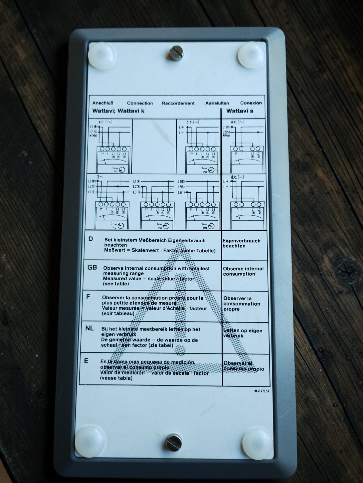 Rear view of the Wattavi k wattmeter showing wiring diagrams and operating notes in German, English, French, Dutch and Spanish
