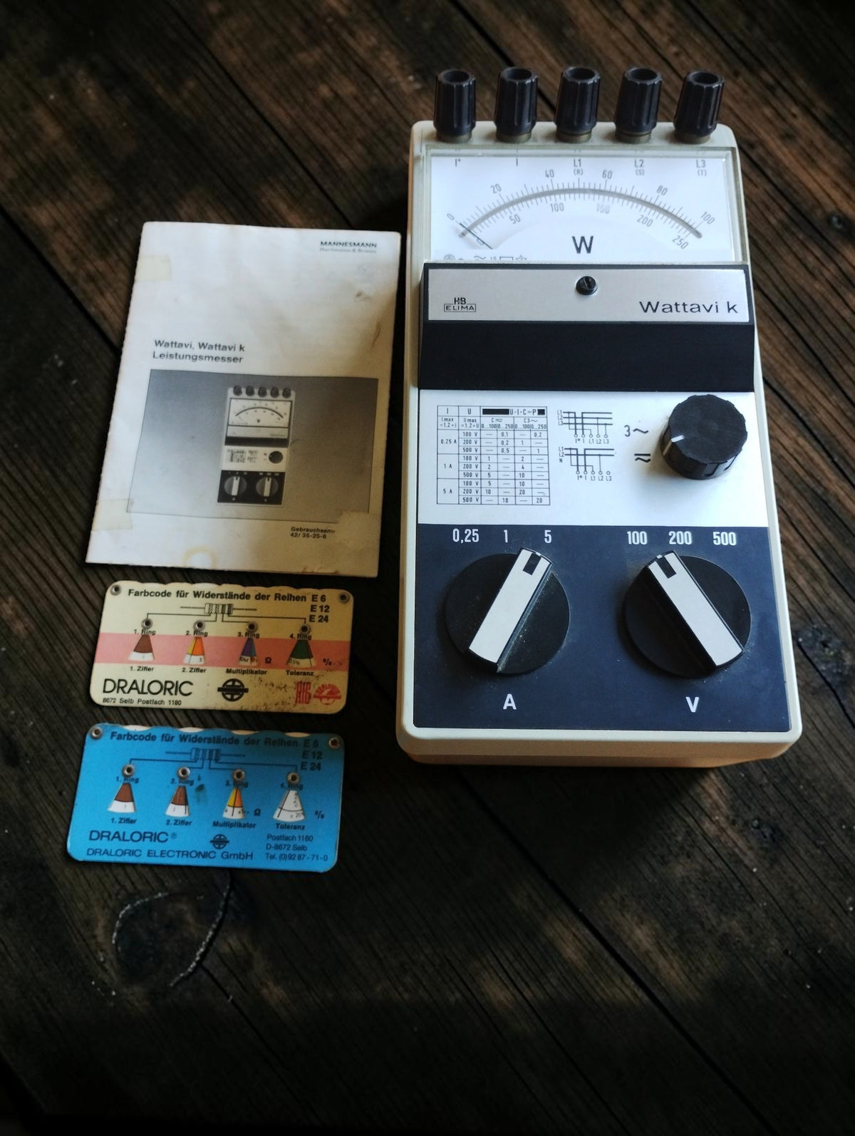 Hartmann & Braun H&B Elima Wattavi k analog wattmeter with original manual and two vintage Draloric resistor color-code calculators
