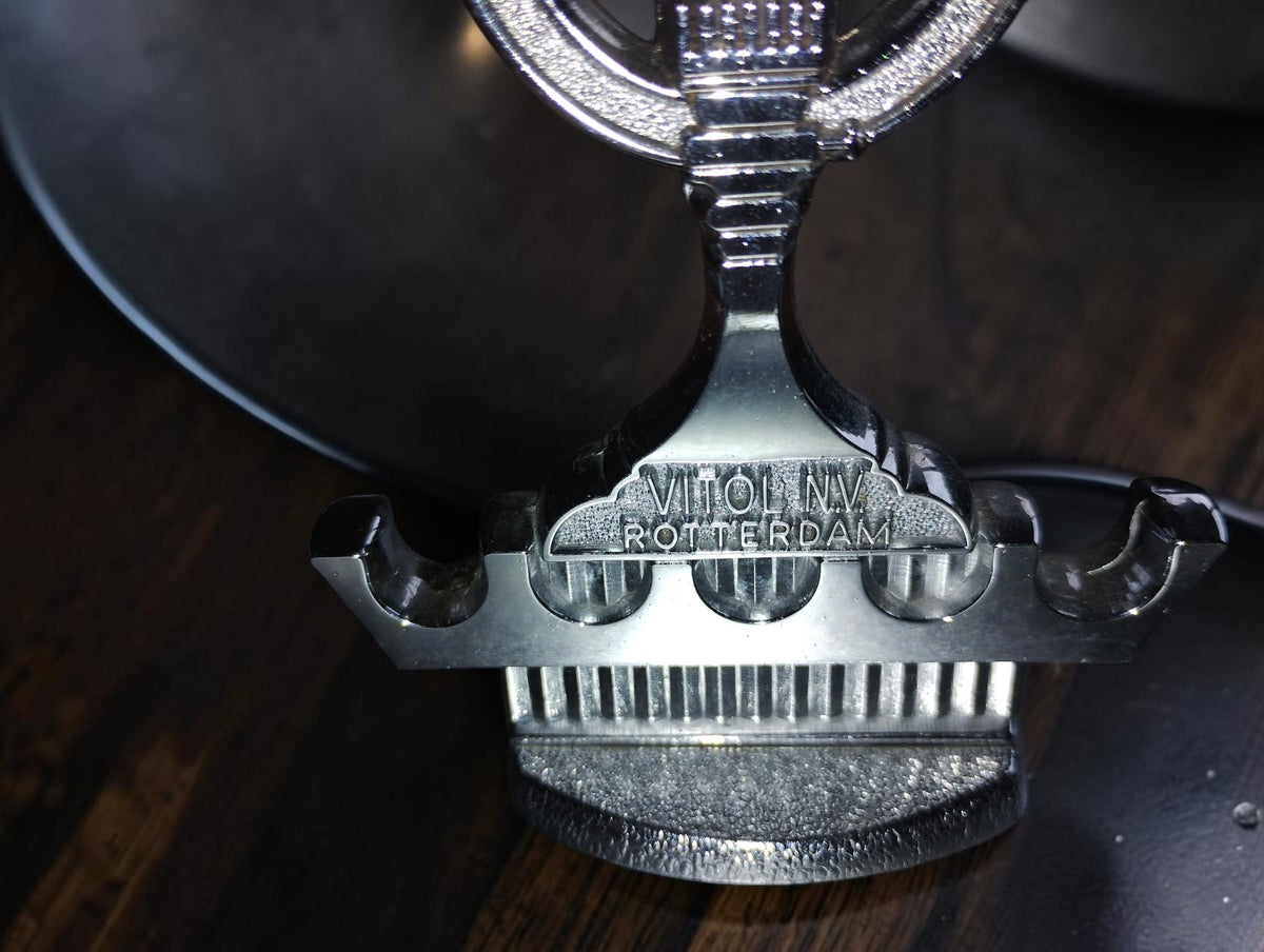 VITOL N.V. ROTTERDAM inscription and integrated pipe rack on the vintage metal pipe ashtray
