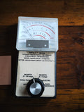 AlphaLab TriField Meter Model 100XE with analog display and rotary selector, front view
