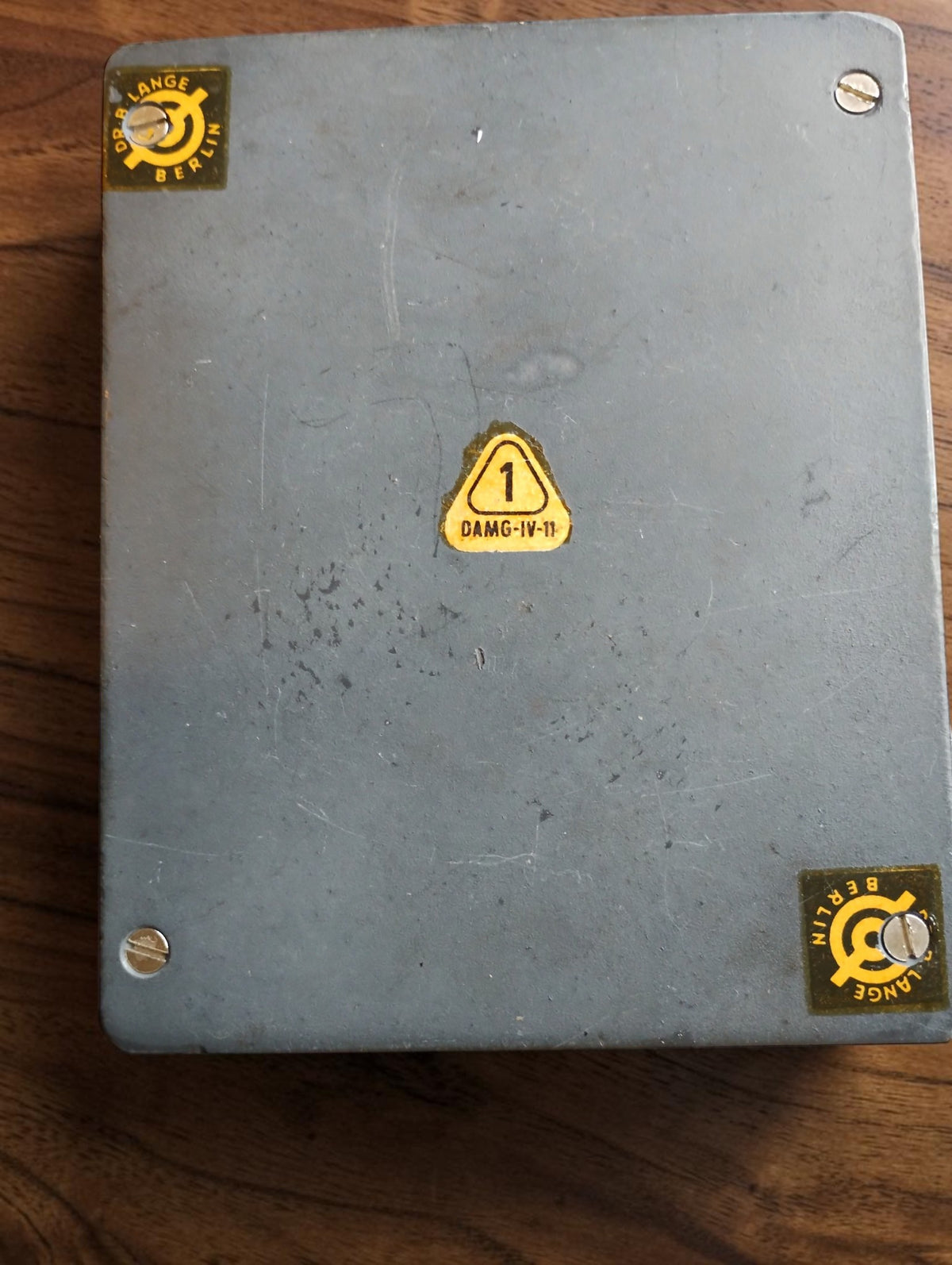 Underside of the luxmeter with Dr. B. Lange Berlin labels, DAMG-IV-11 sticker and visible surface wear

