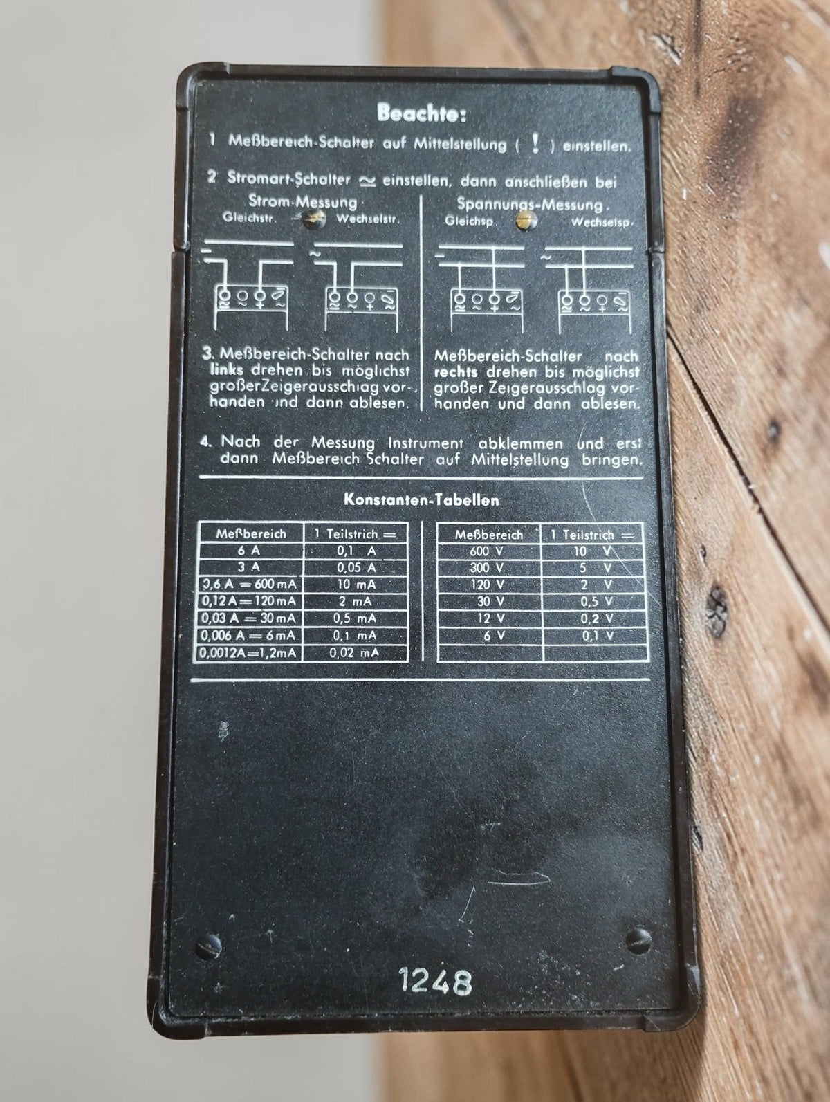 Inside of the lid of the Gossen UVA meter with original measuring tables, connection diagrams and serial number 1248
