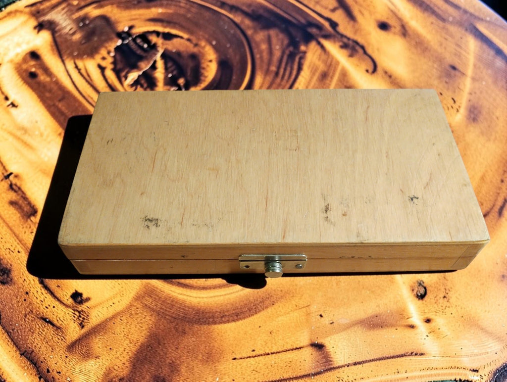 Closed wooden storage case with metal clasp for the VIS MMCc 25-50 outside micrometer.
