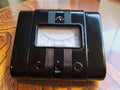 Gossen Megohm 60 V vintage insulation resistance meter with a glossy black Bakelite case and analog dial
