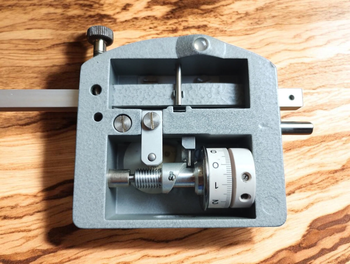 Underside of the A. OTT polar planimeter measuring unit, showing the mechanical wheel and adjustment assembly
