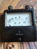 Siemens vintage analog ohmmeter with black Bakelite housing, resistance scale, Siemens logo, and two top terminals.
