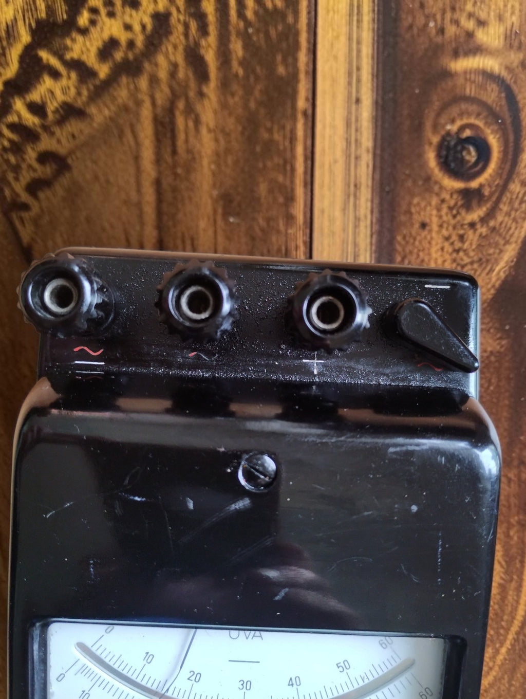 Close-up of the Gossen UVA multimeter's three top terminals and current selector switch.
