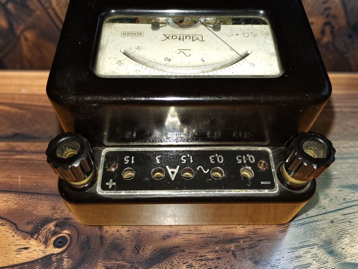 Multax Berger analog multimeter terminals with polarity markings and AC current range sockets
