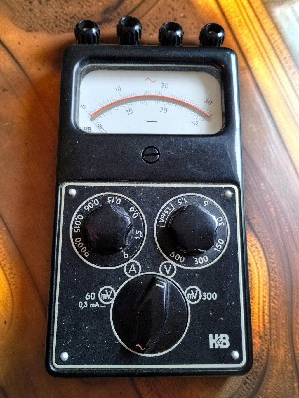 Front view of the Hartmann & Braun Multavi 5 analog multimeter showing the dial window and black control panel with rotary range selectors
