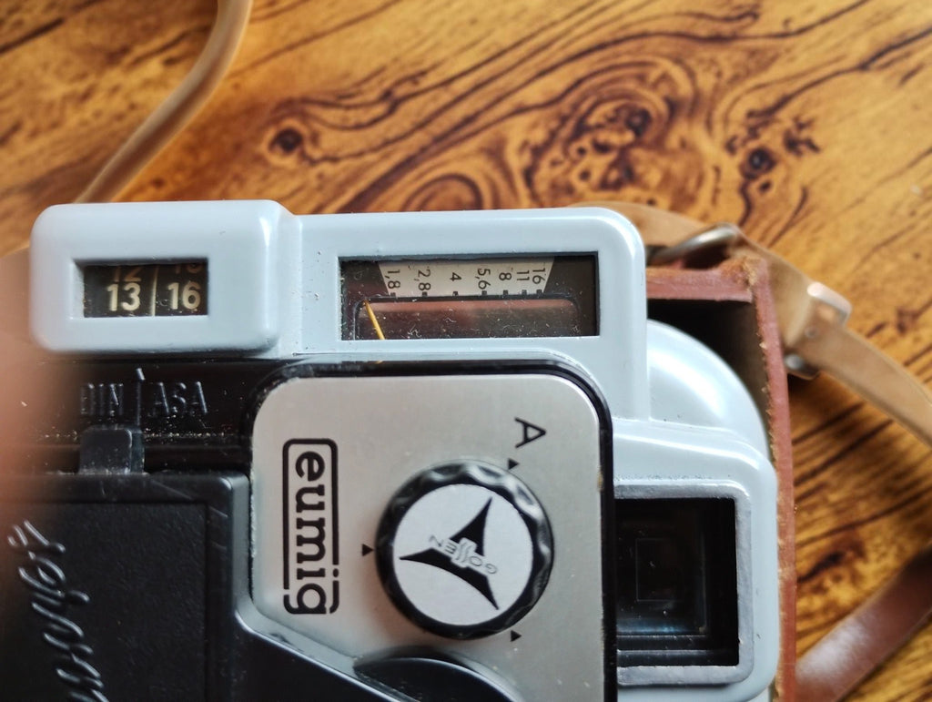 Close-up of the Gossen light meter, aperture scale and controls on the Eumig Servomatic movie camera
