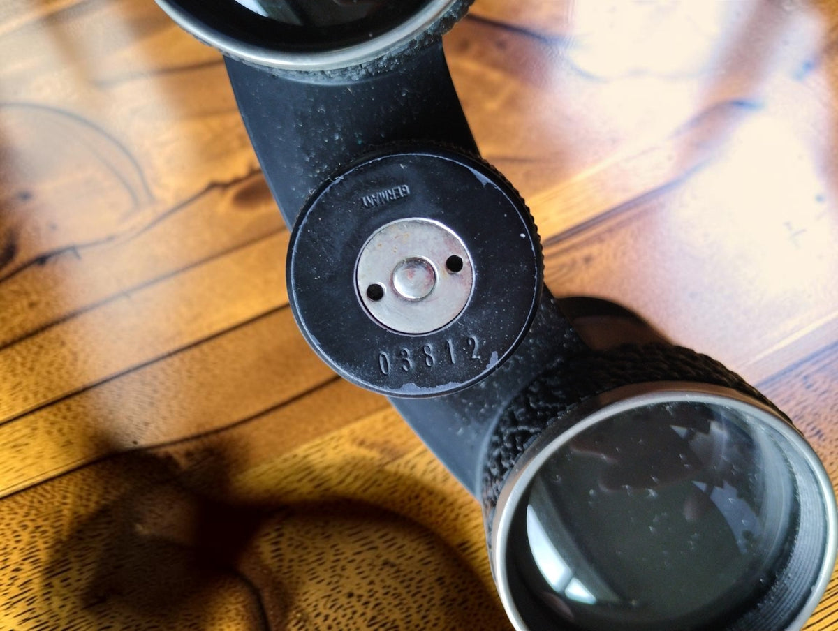Close-up of the GERMANY marking and number 03812 on vintage Aida opera glasses
