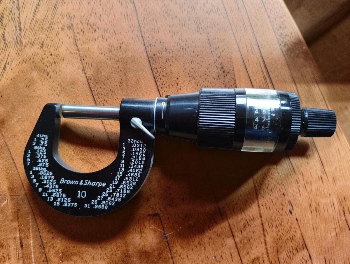 Brown & Sharpe No. 10 outside micrometer showing the mechanical digit readout, graduated thimble and locking lever
